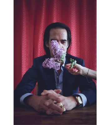 Nick Cave mit Blume