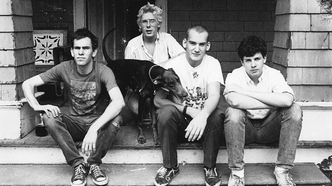 Minor Threat and Susie on Dischord House front porch, 1982 by Rebecca Hammel