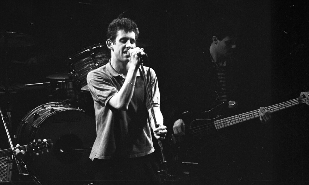 The Pogues on stage at The Olympia Ballroom 19/12/1986. 1286-536 (Part of the Independent Newspapers Ireland/NLI Collection). (Photo by Independent News And Media/Getty Images)